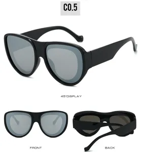 Occhiali da sole scudo nero oversize donna, stile hip-hop di tendenza dettaglio montatura.