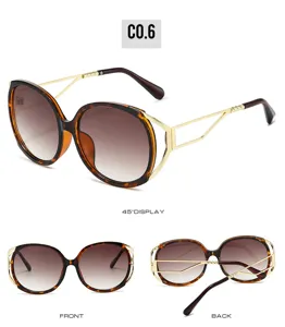 Oversized oval fashion sunglasses for women featuring gradient lenses and stylish metal temples.
