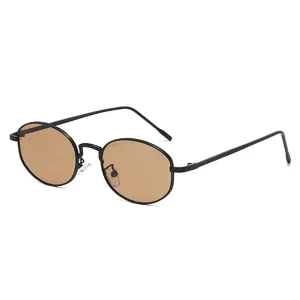 Retro oval sunglasses for men and women, minimalist thin metal frame with brown lenses.