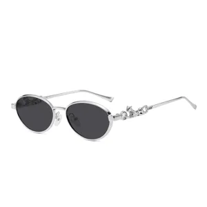Trendy oval metal sunglasses with chic leopard temple design for women and men daily wear.