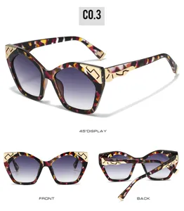 Fashion cat-eye sunglasses for women, gradient lenses, tortoiseshell frame with gold metal details.