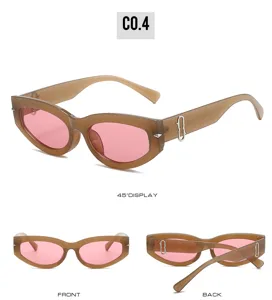 Retro cat eye zonnebril voor dames, trendy roze lenzen met unieke metalen details aan de zijkant.