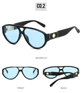 Trendy double-bridge aviator sunglasses detail with stylish hollow circle temples and blue lenses.