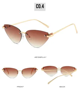 Gradient brown rimless cat eye sunglasses with stylish gold metal frame detail.