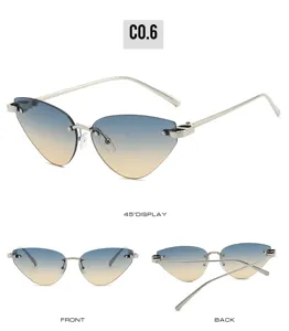 Rimless cat-eye gradient sunglasses for women, fashionable metal frame shades for daily wear.