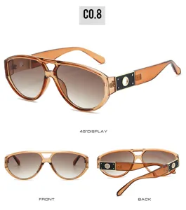 Detail view of trendy double bridge aviator sunglasses with hollow circle temple design.