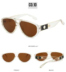 Detail view of trendy double bridge aviator sunglasses with hollow circle temple design.