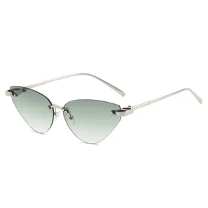 Rimless cat eye sunglasses with gradient lenses and metal temples for women fashion.