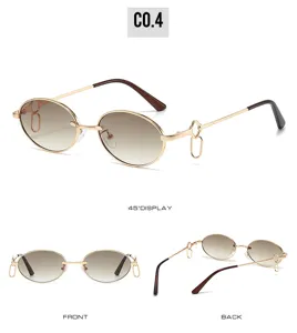 Detail view of trendy oval metal sunglasses with gradient lenses and unique side ring charms.