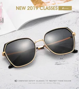 Fashionable polygon sunglasses for women with trendy black and gold metal frames and polarized lenses.