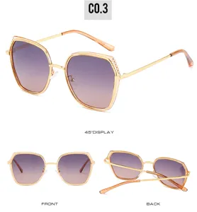 Detailed view of stylish women's polarized sunglasses with elegant gradient lenses and gold frame.
