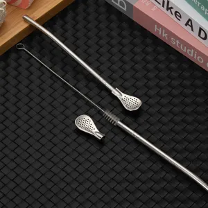 Detachable stainless steel bombilla straw spoon with cleaning brush, yerba mate filter tool detail view.