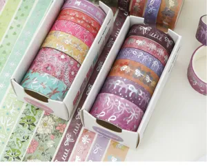 Lot de rubans adhésifs décoratifs washi pour journal DIY, avec motifs floraux et nœuds.