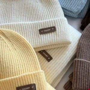 Winter thick ribbed knit beanie cap set for women, cozy fleece warm woolen hat detail view.