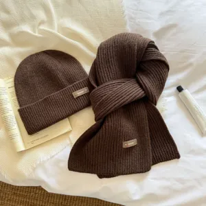 Warm brown knit beanie and scarf set for women, thick winter woolen two-piece matching hat.