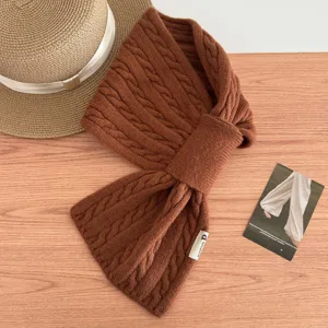 Korean style autumn winter solid color cable knit cross scarf warm neck wrap for women.