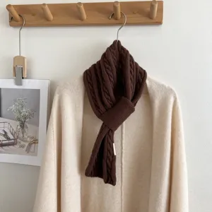 Brown twist knit scarf for women, cozy winter cross neck warmer and stylish cold weather accessory.
