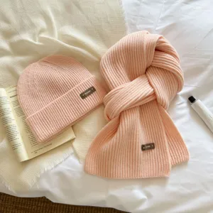 Cozy pink knit beanie and scarf two-piece set, thick warm winter women fashion hat.