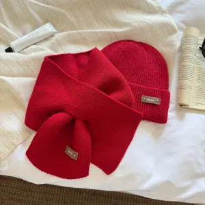Red knitted beanie and cross scarf set, warm winter hat and neck warmer for women.