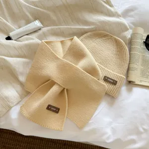 Beige knitted scarf and beanie hat set for women, warm winter neck warmer and wool cap.