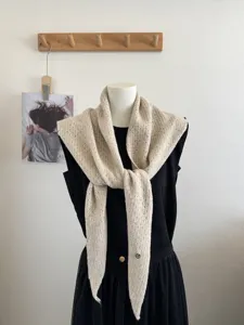 Chic beige knit hollow shawl for women, stylish autumn winter versatile neck warmer cape.