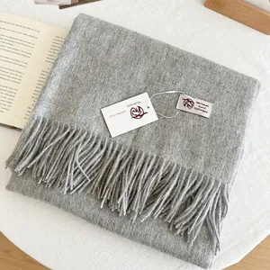 Cozy 100% wool winter scarf in solid grey with elegant fringe, soft and warm gift.