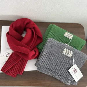 Pure wool knitted winter scarf set featuring vibrant colors, soft texture and cozy warmth.