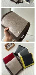 Detail view of the cozy wool-blend colorblock winter scarf showcasing soft texture and warm styling.