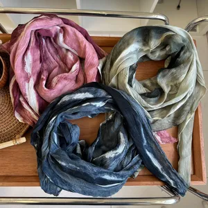 Detailed view of Japanese cotton linen tie-dye scarf, lightweight wrinkled design for women