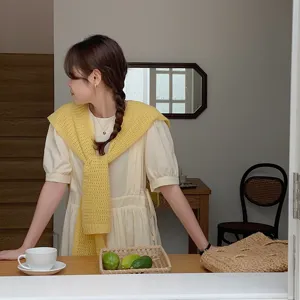 Detailed view of the sweet Japanese style solid color knitted hollow shawl and fake collar.