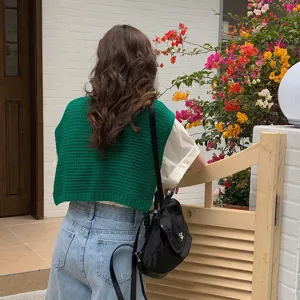 Detailed shot of green hollow knit vest women casual hollow out layering top lightweight summer outerwear