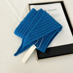 Cozy blue wool knitted triangular scarf for women, warm lazy style autumn shawl fashion item.