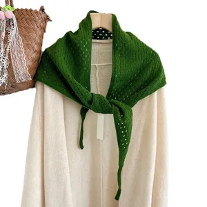 Green hollow knitted triangle scarf for women, chic solid color wool shawl for daily wear.