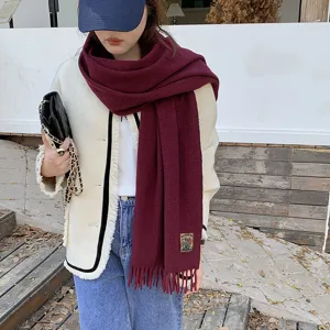 Winter solid color warm fringe imitation cashmere scarf for women, classic style daily wear.