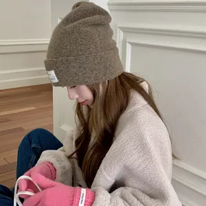 Autumn winter knit beanie hat for women, warm slouchy cap with cute cloth label for cold weather.