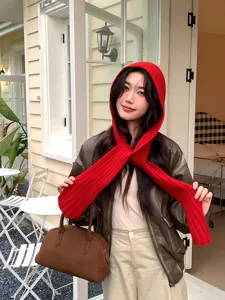Red knitted balaclava hood scarf winter warm headwear outdoor cycling fashion accessory.