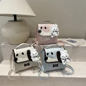 Leuke cartoon puppy design PU leer rugzak en schoudertas met pluche hanger voor meisjes