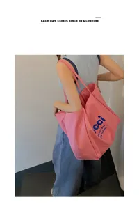 Pink canvas tote bag with shoulder straps, large capacity casual daily commuter shopping bag.