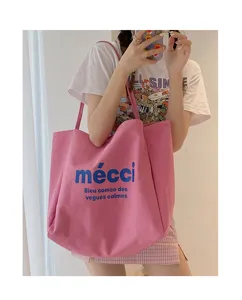 Pink canvas tote bag detail view, casual large capacity shoulder bag for daily use.