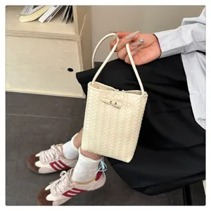 Chic beige woven PU leather bucket shoulder bag with elegant horn buckle for daily style.