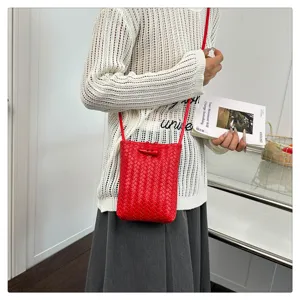 Red woven PU leather crossbody phone bag with cute toggle button, stylish mini shoulder bag.