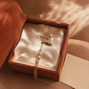Elegant metal heart charm and tassel pendant for stylish women bags and accessories detail.