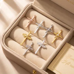 Fashion cross pendants with sparkling zirconia and heart bow design for stylish jewelry making.