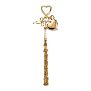 Gold metal heart bow keychain bag charm, elegant accessories for women handbags and keys.