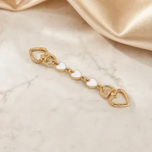 Gold metal heart bag chain keychain with white enamel charm elegant accessory for women
