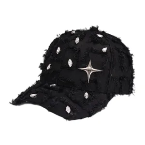 Distressed black baseball cap with sparkling rhinestones and a striking metal star emblem.