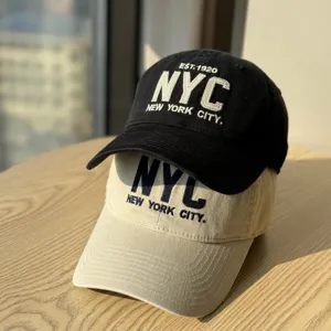 Detailed shot of the casual embroidered NYC letter soft top baseball cap, stylish and comfortable.