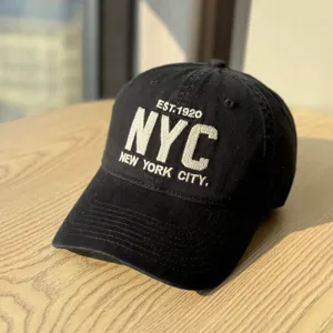 Classic black baseball cap with white embroidered NYC letters, casual soft top dad hat for daily wear.