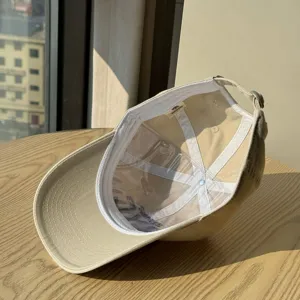 Detailed interior view of beige casual soft baseball cap comfortable and stylish.