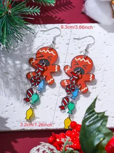 Boucles d'oreilles en acrylique bonhomme de pain d'épices de Noël avec pendentifs de bonbons.